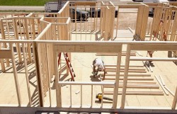 Drone View of a Home being Framed by Carpenters